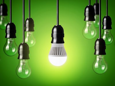 LED bulb and simple light bulbs.Green background